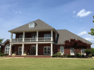 Home with a new roof installed by Trotman Brothers Roofing and Construction. 