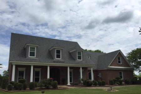 Home has a roof replacement after tornado damage. 